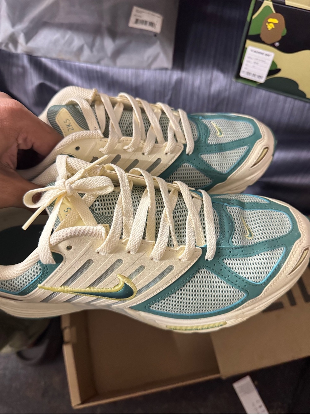 Nike Women’s Teal and Cream sneakers with lime accent